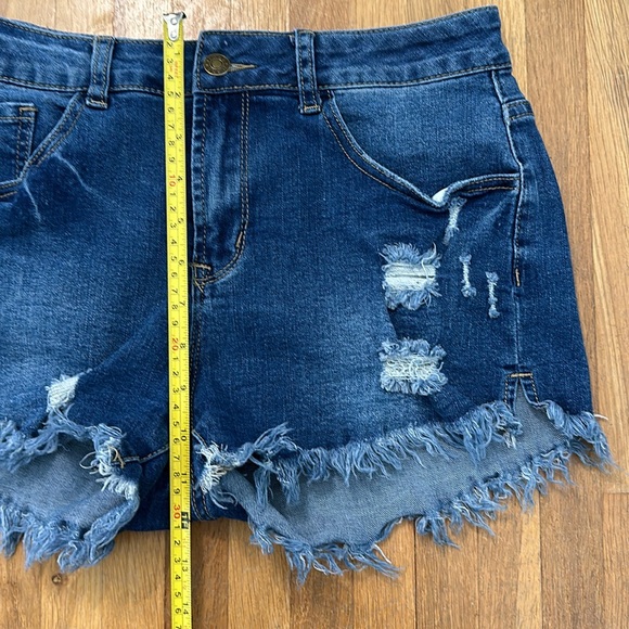 Women’s blue denim distressed jean shorts - Picture 10 of 16